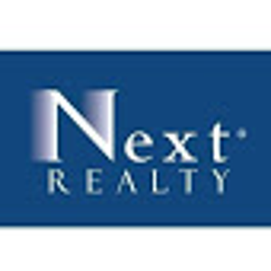 Next Realty logo